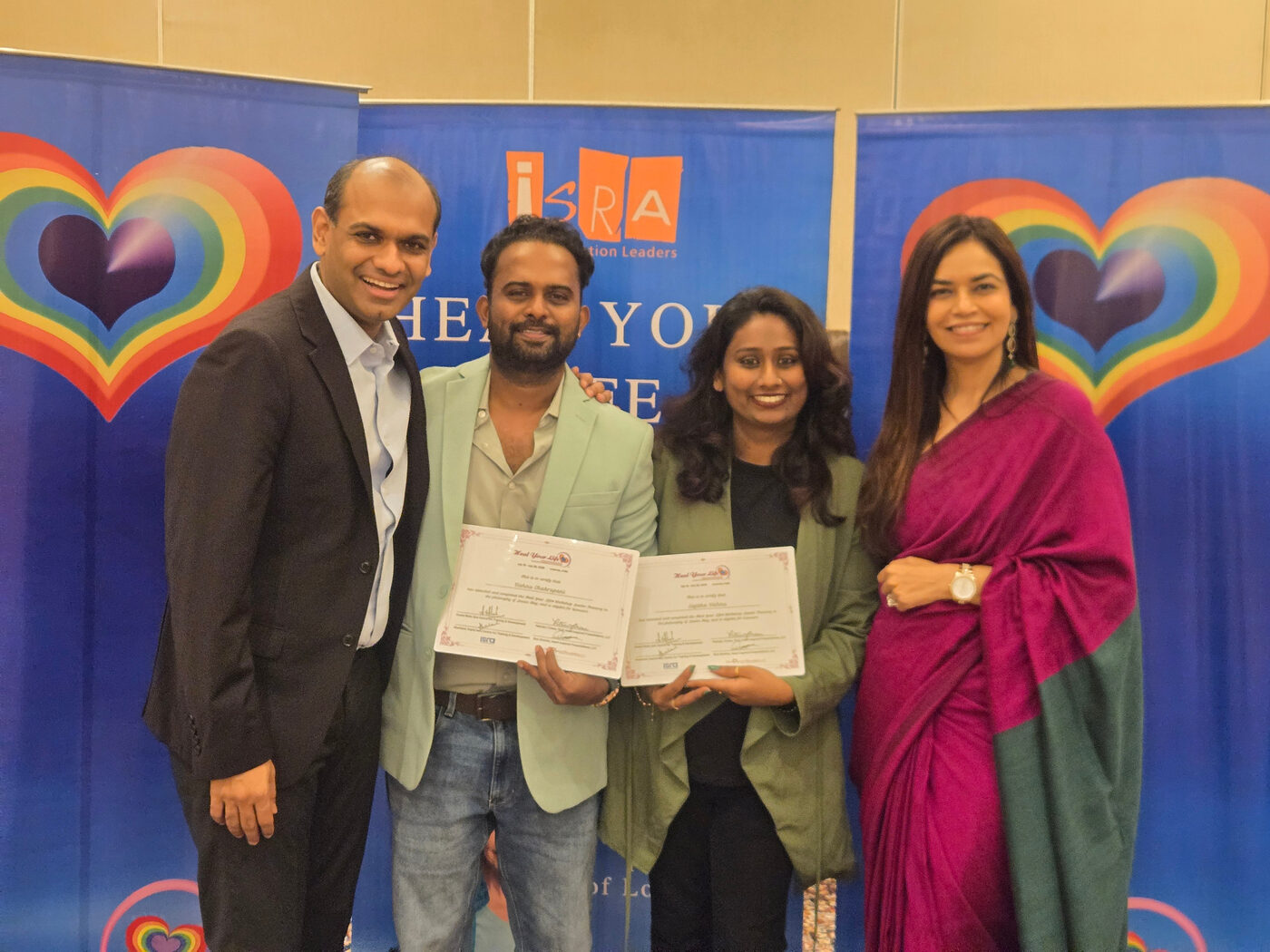 Vishnu Chakrapani and Sajitha Vishnu with their professional training certificates